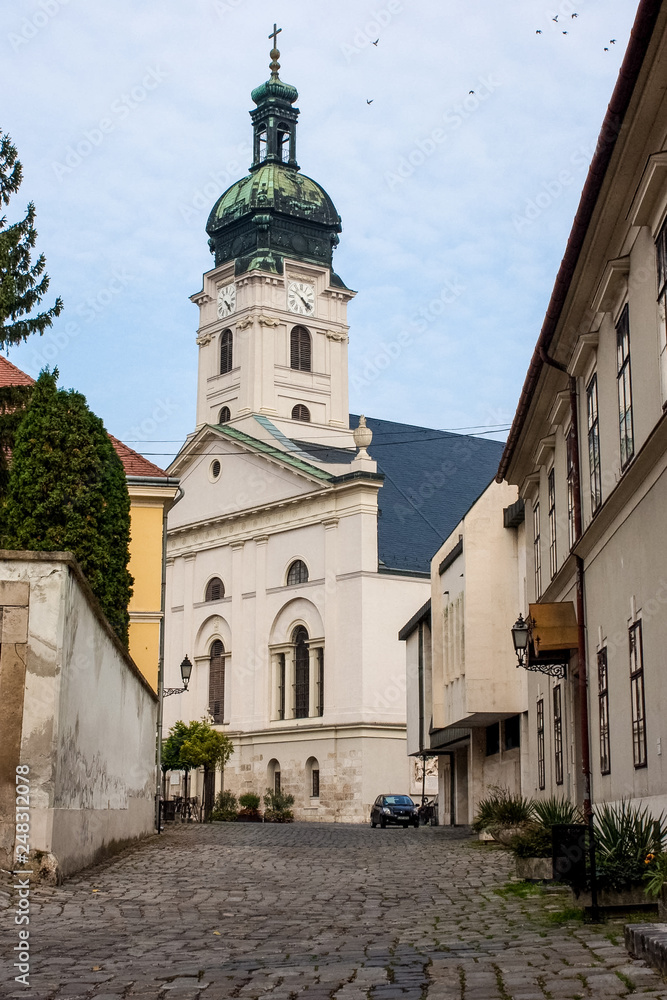 Historic Hungarian city views of Gyor, with churches old lanterns and Szechenyi Square