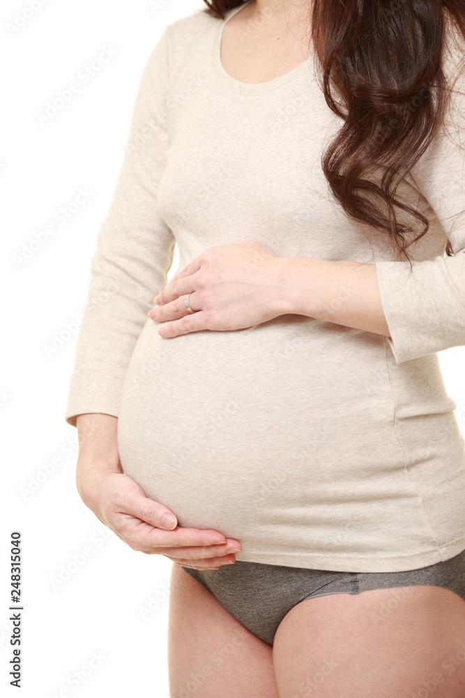 お腹を触る臨月の妊婦 Stock Photo Adobe Stock
