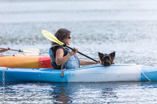 Woman Kayaking with her pet dog