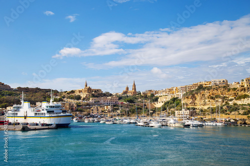 Harbour and dock of Gozo island, Malta, called Mgarr. Place where ferries from Malta to Gozo arrive and dock. photo