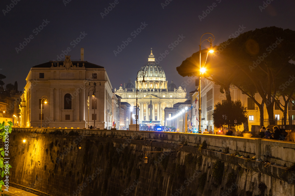 Rome night skyline with Vatican St Peter Basilica