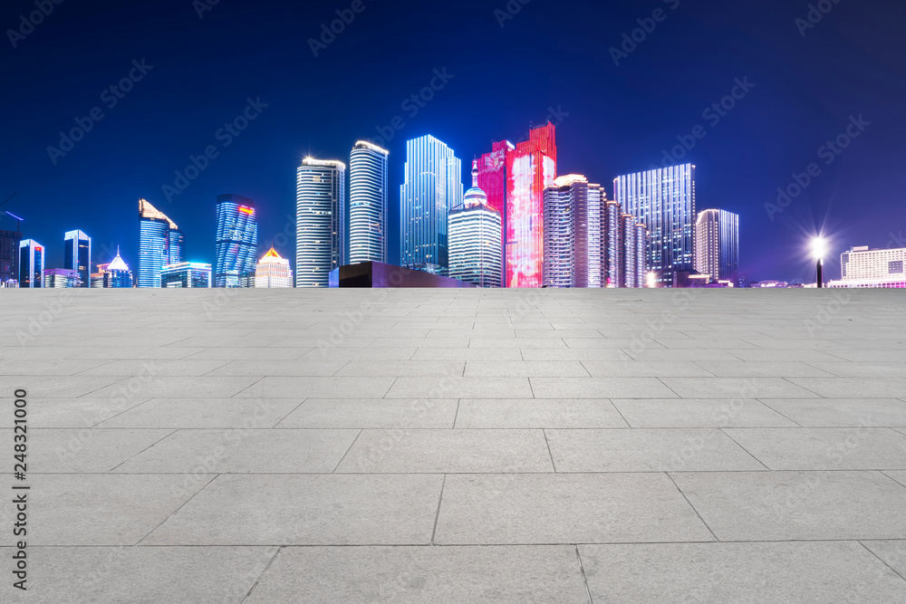 Empty Plaza Floor Bricks and the Skyline of Modern Urban Architecture in Qingdao..