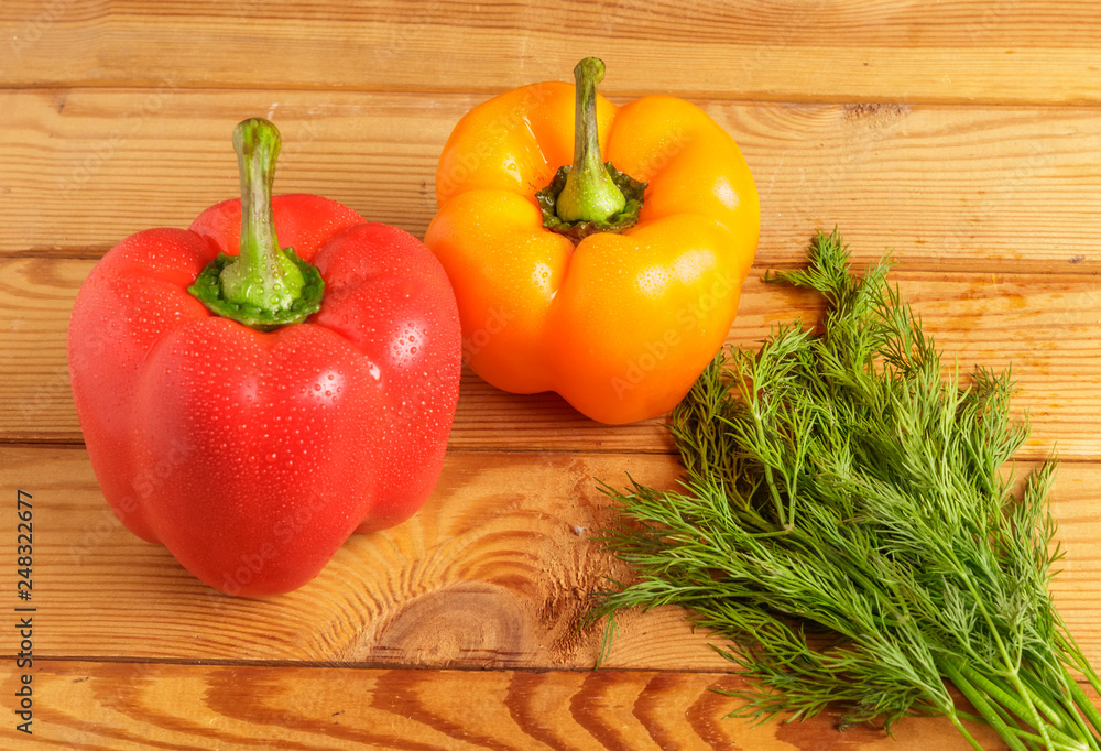 Bulgarian sweet pepper and dill on the cutting Board. Bulgarian sweet pepper and dill on the cutting Board.