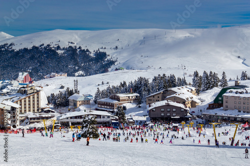 Winter ski resort,ski lift,people skiing. Uludag Mountain, Bursa, Turkey photo