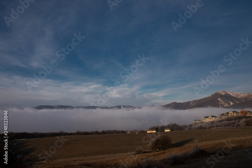 Mountains and Hills panoramic view of the landscape. villages and approaching fog.