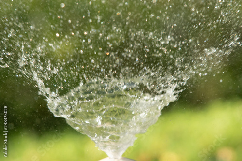 defocused, splashing water, blurred drops bokeh nature