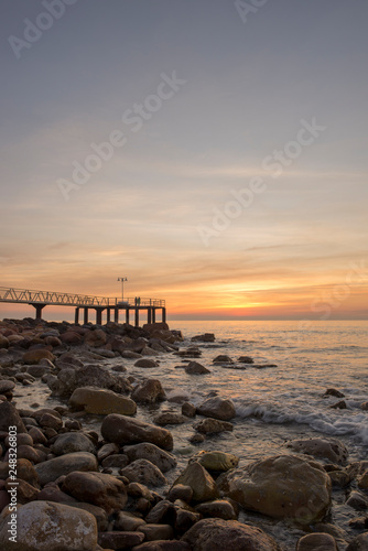 Walkway to the lookout on chilches beach at sunrise