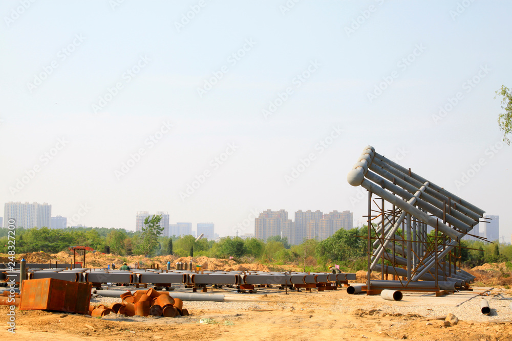 Fototapeta premium Gray steel structure in construction site