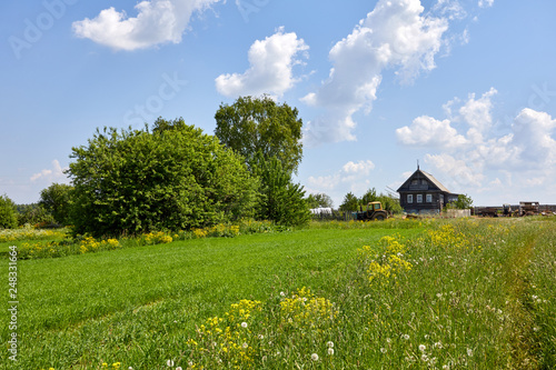 Russia. View of the village. Summer rural landscape with houses