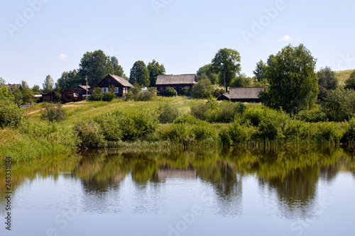 Russia. View of the village. Summer rural landscape with houses