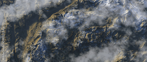 Clouds over snowy mountains. Aerial.