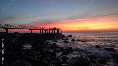 Walkway to the lookout on chilches beach at sunrise photo