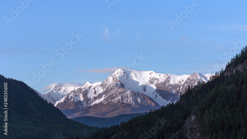 Beautiful winter landscape with snow covered mountain peaks