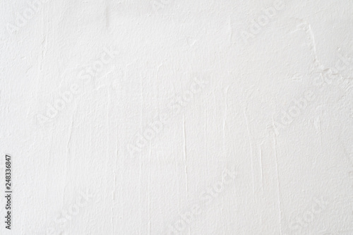 white rough concrete wall, real detail surface texture and empty space for background or design
