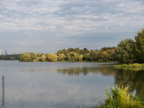 Fototapeta Naklejka Na Ścianę i Meble -  Autumn foliage with water reflection natural landscape