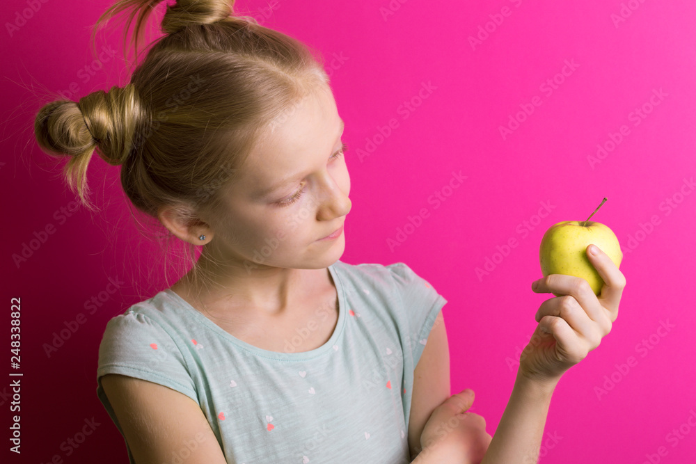 little girl blonde on a pink background little girl blonde on a pink background
