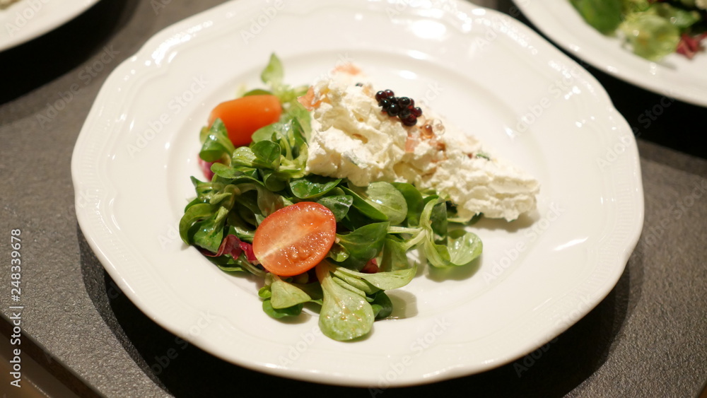 Fresh salad, valerian, tomato, cheese, caviar Fresh salad, valerian, tomato, cheese, caviar