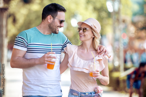 Young couple drinking healthy juice