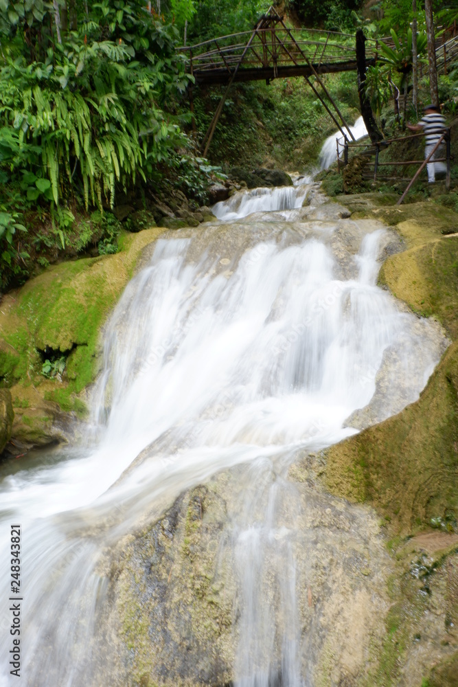 beautiful waterfalls flowing from springs in the forest beautiful waterfalls flowing from springs in the forest
