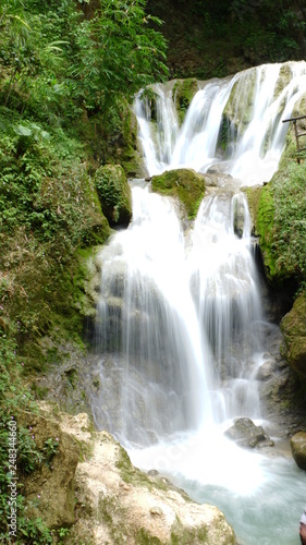 Fototapeta Naklejka Na Ścianę i Meble -  beautiful waterfalls flowing from springs in the forest