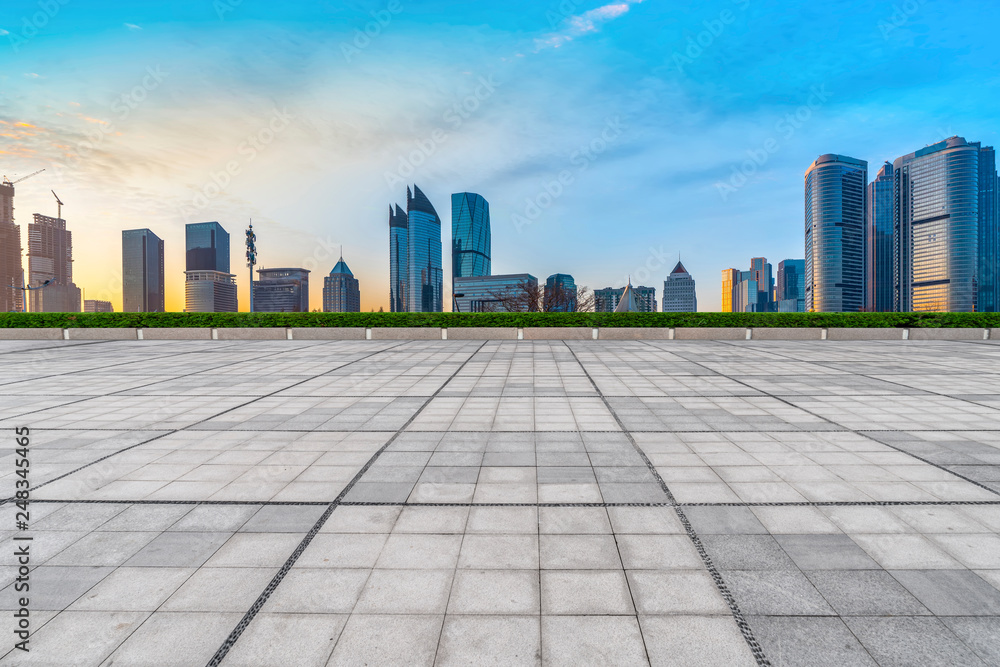 Empty Plaza Floor Bricks and the Skyline of Modern Urban Architecture in Qingdao.. Empty Plaza Floor Bricks and the Skyline of Modern Urban Architecture in Qingdao..