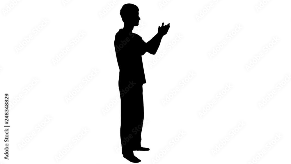 Young Man Boy Gives Applause Applauds On a Match Concert Meeting Claps His Hands Silhouette Young Man Boy Gives Applause Applauds On a Match Concert Meeting Claps His Hands Silhouette