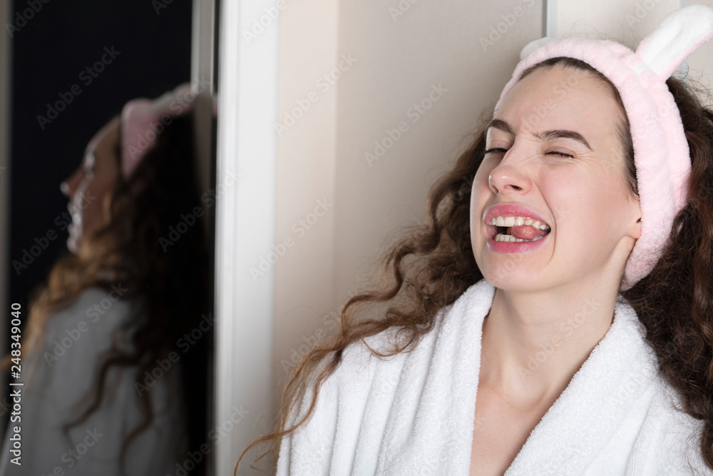 Young beautiful lady getting spa treatment. Women at home applying cream Young beautiful lady getting spa treatment. Women at home applying cream