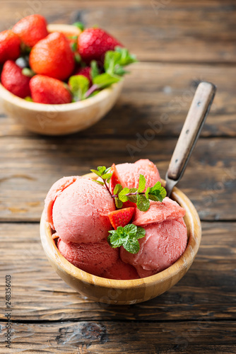 Summer ice cream with strawerry and mint photo