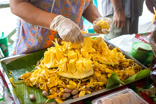 Peeling jackfruit in the market