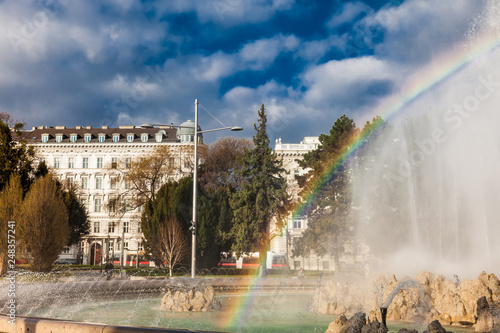 Photography View of the beautiful buildings at Vienna city center and the fountain at Schwar
