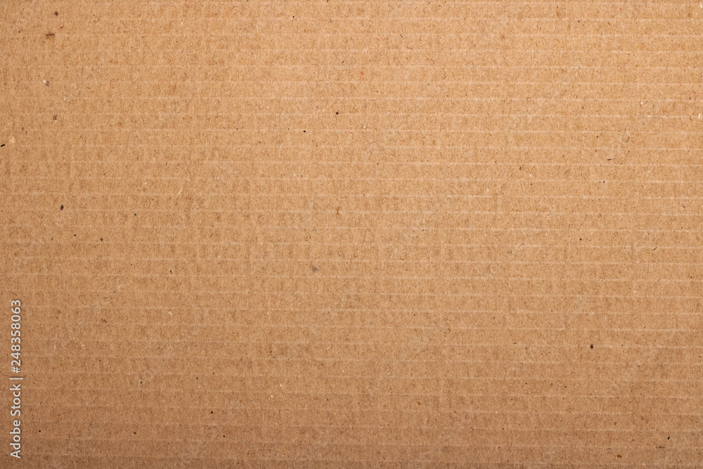 Fototapeta Cardboard box close up background or texture