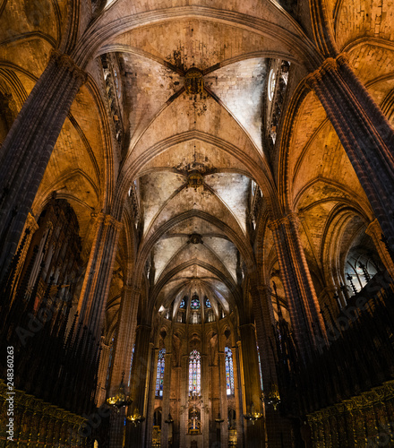 Columns and arches inside Barcelona gothic Cathedral