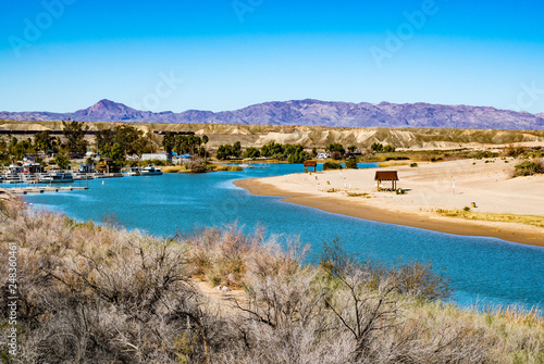 Fototapeta Naklejka Na Ścianę i Meble -  The Colorado River flowing through the Mojave Desert on the border of Arizona and California