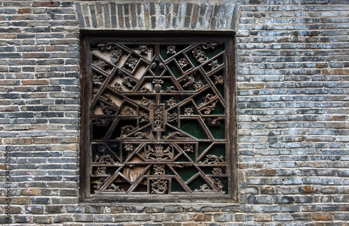 Old window in Furong Ancient Town, Hunan, China. photo