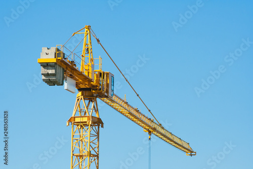 Wallpaper Mural Construction industry of Engineer Business, Technology Concept with Industrial yellow cranes with blue sky ,clouds background Torontodigital.ca