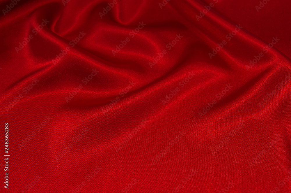 Obraz premium red satin or silk fabric as background