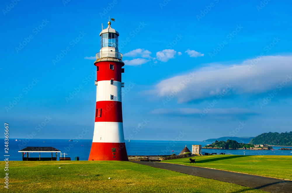 Smeaton´s Tower on the Hoe at Plymouth, Devon, UK. The tower was formerly sited on the Eddystone, 14 miles SW of Plymouth. - obrazy, fototapety, plakaty 