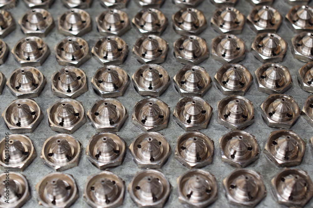Tip for paint spray gun manufacture for CNC machine. Detail of spray gun parts. Tip for paint spray gun manufacture for CNC machine. Detail of spray gun parts.