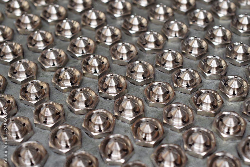 Tip for paint spray gun manufacture for CNC machine. Detail of spray gun parts. Tip for paint spray gun manufacture for CNC machine. Detail of spray gun parts.