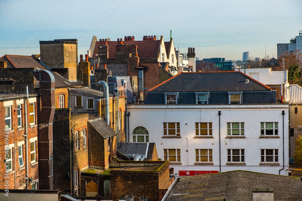 London, United Kingdom - Panoramic view of the Whitechapel district of East London with fusion of traditional and modernistic architecture neighboring Whitechapel street