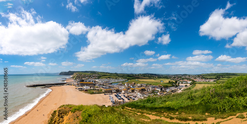 BRIDPORT, DORSET, UK - 6JUN2018: West Bay from cliffs to the East. Inland, the town of Bridport can also be seen.