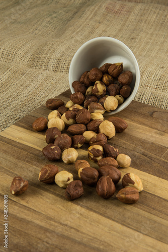 nuts in bowl on wooden table