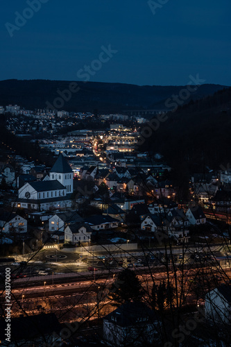 Stadt Meschede bei blauer Stunde mit Sicht auf die Pfarrkirche Mariä Himmelfahrt photo