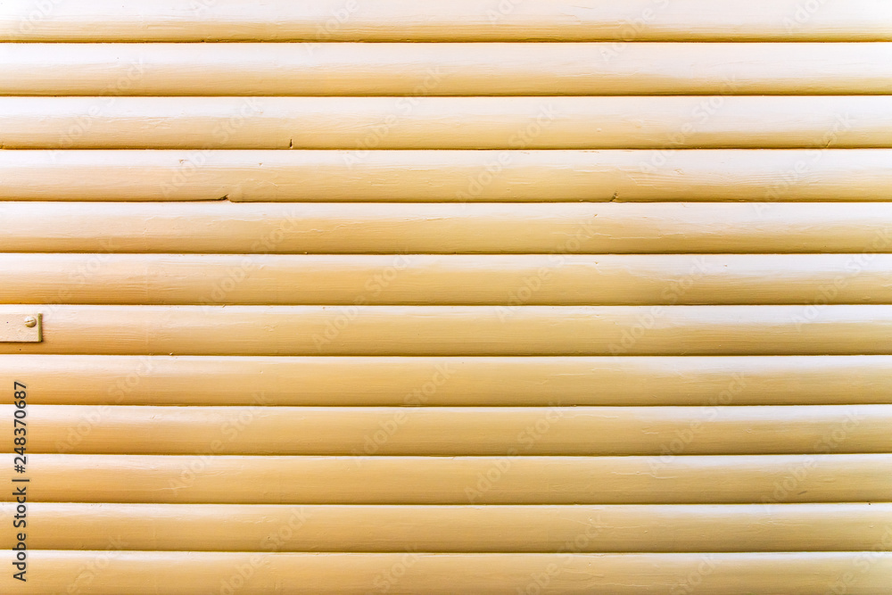 Section of yellow wood panelling from a seaside beach hut. Perfect as a background for Summer Holiday or seaside themes. Section of yellow wood panelling from a seaside beach hut. Perfect as a background for Summer Holiday or seaside themes.