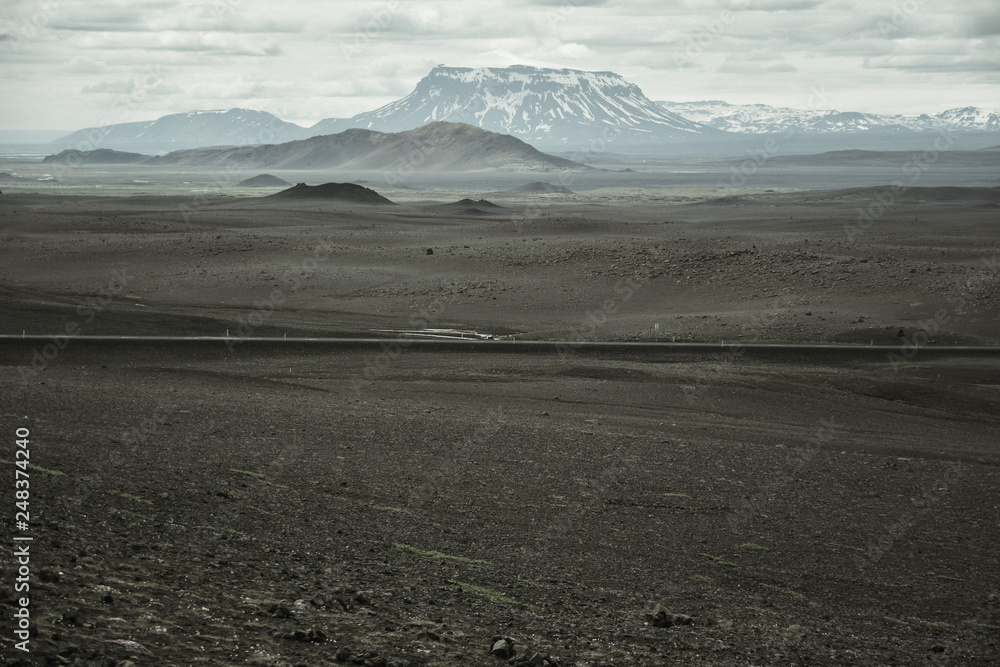 Typical ring road view with empty road in the background without any cars and people in Iceland in summer, film effect