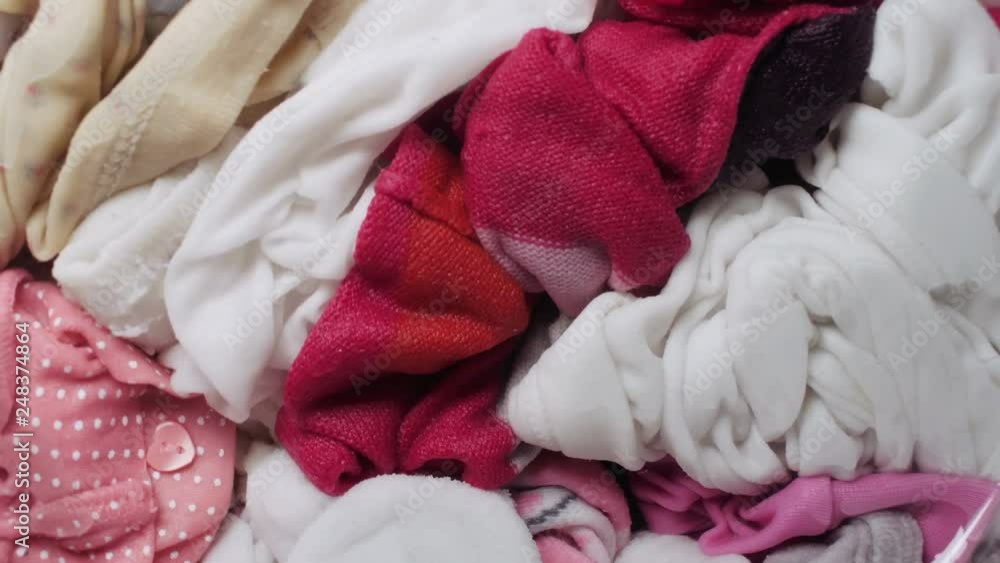 Close up at full load of clothes in washing machine. Close up at full load of clothes in washing machine.