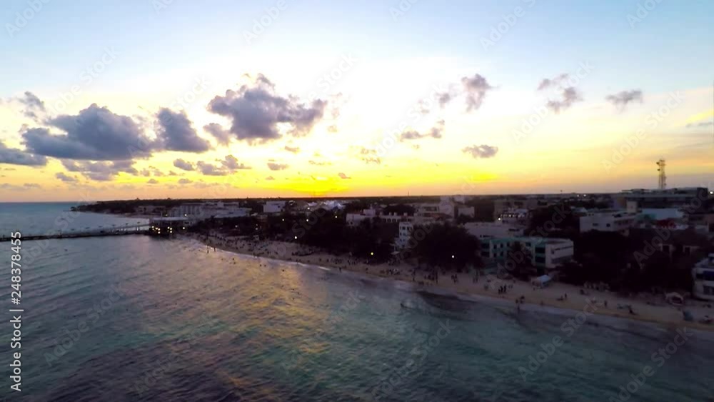 Playa Del Carmen, Mexico. Beautiful sunset over coast of Caribbean sea and beach. Aerial view Playa Del Carmen, Mexico. Beautiful sunset over coast of Caribbean sea and beach. Aerial view