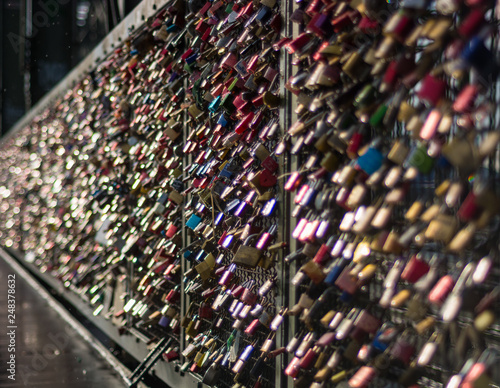 Love locks chained to bridge. Hohenzollern Bridge in Cologne, Germany.