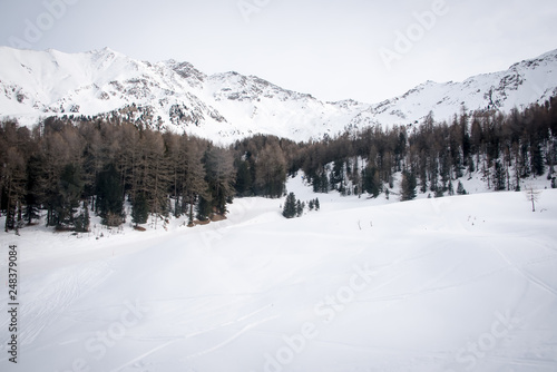 Mountain skiing - panoramic view at the ski slopes Aosta Valley, Italy .