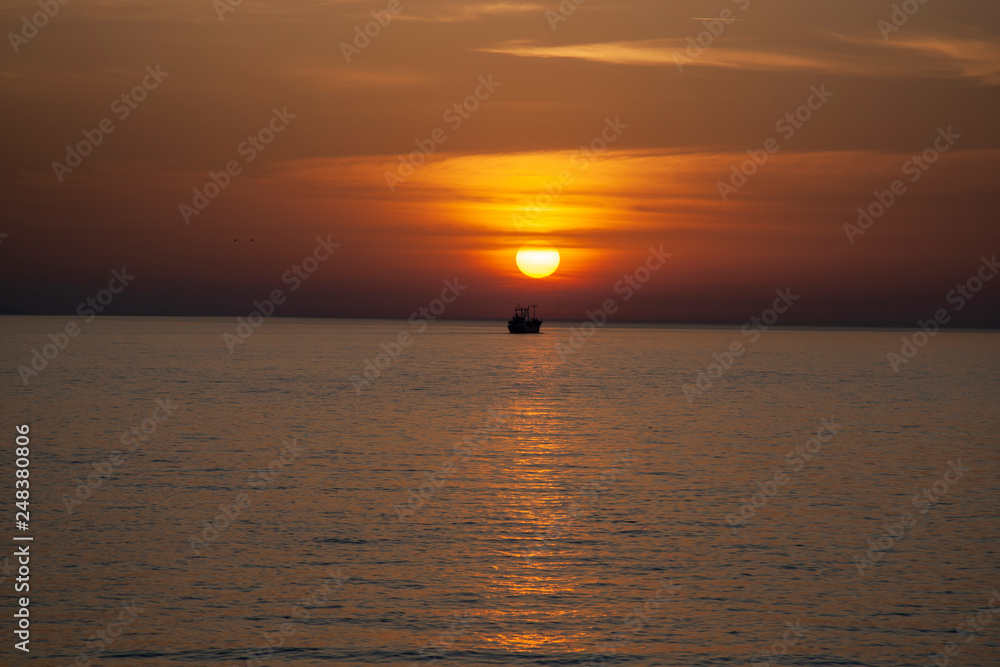 sunset sea sun ocean sky